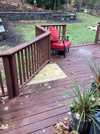 Deck with a section of the boards replaced post repair. 