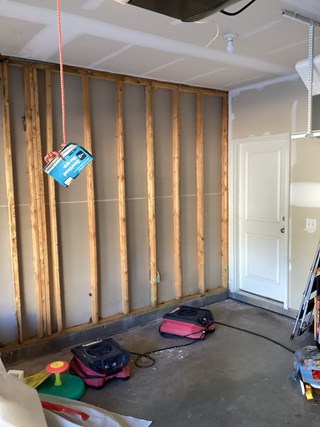 New garage wall construction in youngsville nc before being enclosed with drywall by ace handyman services