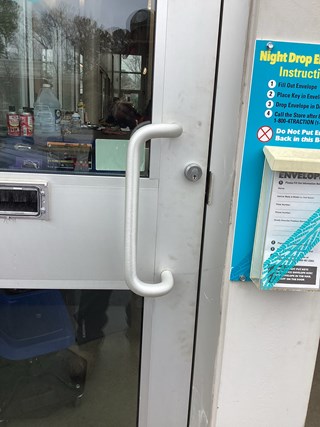 Exterior commercial door after Ace Handyman repairs. 