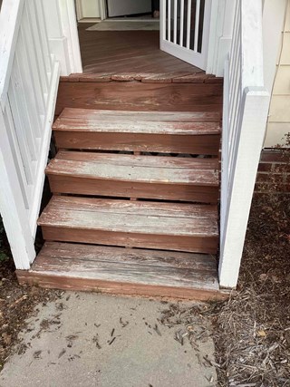Weathered wooden steps in Morrisville NC before repair.