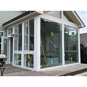 Recently completed sunroom conversion with brand new Pella windows