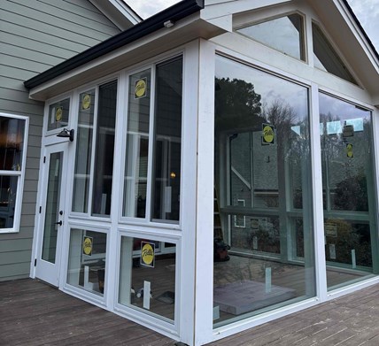 Completed porch enclosure project with custom-framed Pella windows in Fuquay Varina, NC, installed by AHS craftsmen Bradley and Eric. Completed porch enclosure project with custom-framed Pella windows in Fuquay Varina, NC, installed by AHS craftsmen Bradley and Eric.