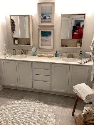 New bathroom vanity before professional hardware installation services