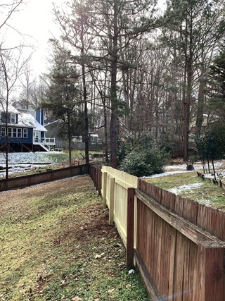 6-foot wooden privacy fence installation in Cary NC 27513 completed by local Ace Handyman.