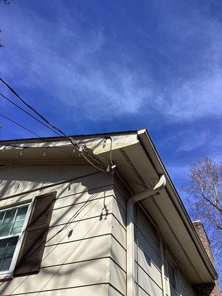 Newly repaired wood fascia by expert carpenter in Raleigh NC