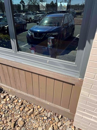 Wooden commercial window sill after repair in Durham 27707
