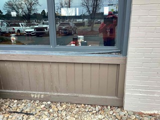 Wooden commercial window sill before repair 
