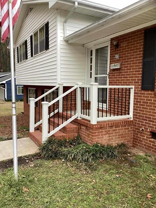 New-white-vinyl-with-black-spindles-after-professional-installation