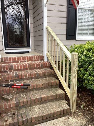 old-damaged-wood-railing-replaced-with-new-lumber-by-professional-carpenter