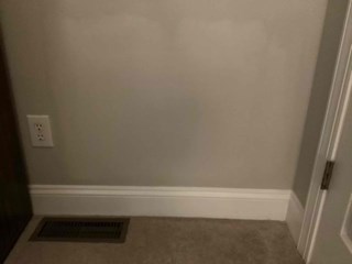 drywall-after-repair-damage-has-been-repaired-and-painted