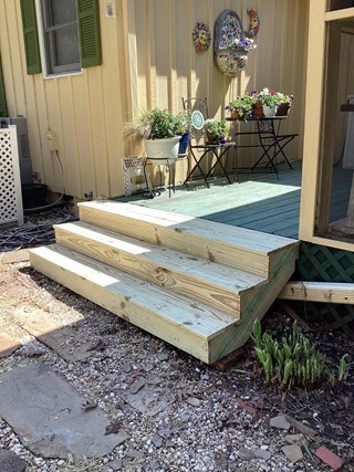Wooden-porch-steps-after-professional-carpentry-repair