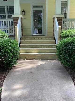 Completed carpentry repairs of wooden steps and railings in Raleigh NC 27614.