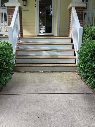 Weathered wood steps requiring carpentry repair in Raleigh NC 27614