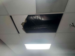 Commercial Ceiling Tile requiring facility maintenance due to water damage before Durham NC 27713