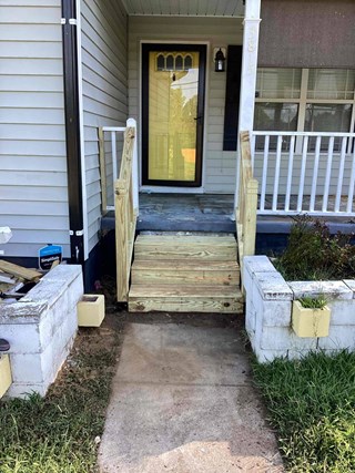 Wood steps and handrails after carpentry repair by Ace Handyman Services Durham 27703