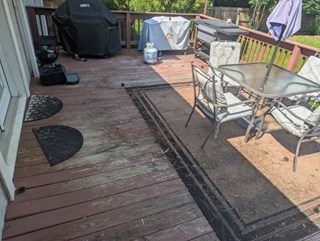 Worn and weathered wood deck before staining in Apex, NC 27502, prepped for restoration by Ace Handyman Services