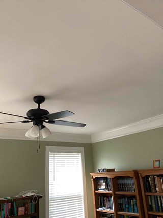 Smooth drywall ceiling repair and fresh paint in home office with ceiling fan in Holly Springs, NC 27540 by Ace Handyman Services handyman.