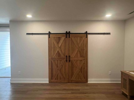 Full wall build with drywall and painting as well as new barn door installation at a West Raleigh NC home. Full wall build with drywall and painting as well as new barn door installation at a West Raleigh NC home.