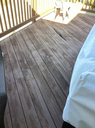 Deck with significant wood rot damage in Cary, NC 27519 prior to repair.