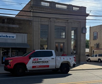 One of the owners in downtown Clayton, NC, in front of the Clayton Chamber of Commerce building on Main Street. One of the owners in downtown Clayton, NC, in front of the Clayton Chamber of Commerce building on Main Street.