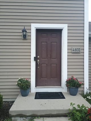 Before Ace Handyman Services handyman installed a new door and storm door in Gahanna, Ohio