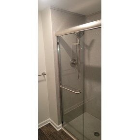 Ace Handyman Services Bathroom Remodel with Onyx Collection shower surround, base, and glass sliding door in Columbus, Ohio