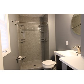 Ace Handyman Services remodeled this bathroom in Westerville, Ohio using Onyx Collection products including shower base, surround and counter with integrated sink