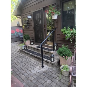 Ace Handyman Services repaired brick stairs and installed a wrought iron handrail in Westerville, Ohio