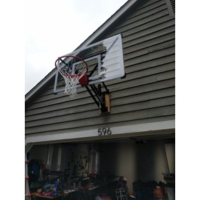 Ace Handyman Services installed a basketball hoop and backboard above a garage in Westerville, Ohio