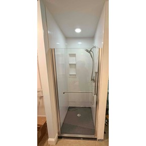 Ace Handyman Services remodeled this shower including installing an Onyx Collection shower base, wall panels, accessories, and frameless door in Westerville, Ohio.