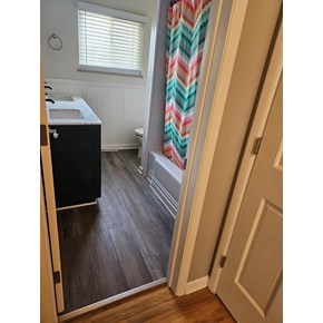 Ace Handyman Services completed a bathroom refresh including installing new flooring, vanity, and fixtures in Columbus, Ohio 