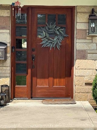 After Ace Handyman Services handyman clean and stained this front door in Dublin, Ohio