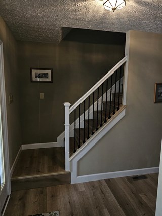 After Ace Handyman Services handyman services remodeled stair railing in Columbus, Ohio
