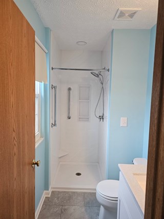 After Ace Handyman Services bathroom remodel this bathroom using Onyx Collection Products in Hilliard, Ohio