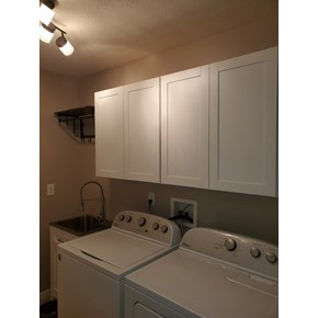 Ace Handyman Services installed new above the washer and dryer cabinets in Lewis Center, Ohio