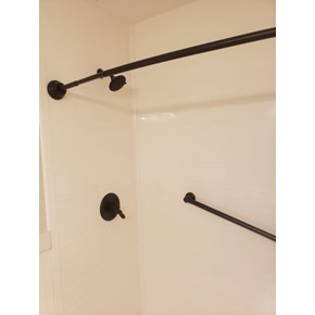 Ace Handyman Services remodeled this shower with Onyx Collection Products, in Pickerington, Ohio