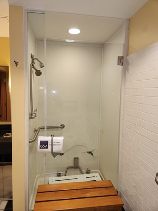 Before Ace Handyman Services handyman remodeled this business bathroom in Columbus, Ohio using an Onyx Collection  shower surround panel
