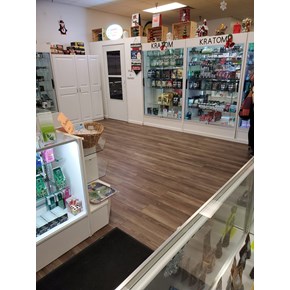 Ace Handyman Services commercial division installed new LVP at Cheap Tobacco 