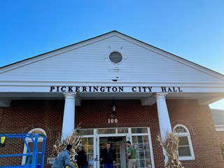 Wood rot on the second story front of City of Pickerington building