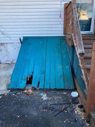 Ace Handyman Services Wilkes-Barre and Scranton Before Photo of Basement Access Door in Old Forge, PA