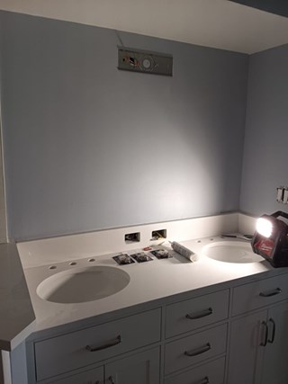 Bathroom vanity, faucets, light, outlets, and mirror install before in North Myrtle Beach, SC.
