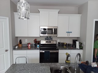 Before installing new handles on cabinet that did not have any originally in Myrtle Beach, SC.