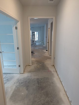 Flooring, trim, and painting before.