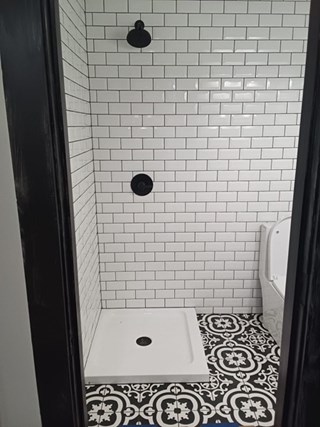 Glass shower wall installation before in Longs, SC