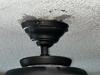 Close Up Ceiling Fan Repair Before
