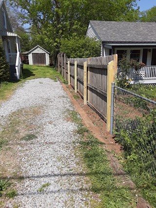 Leaning fence after