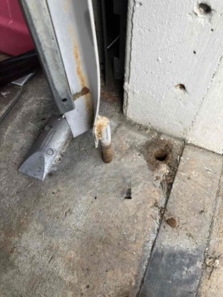 Damaged Gate Pivot