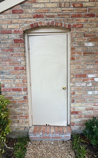 Worn Exterior Door & Brick Mold in Central Houston 