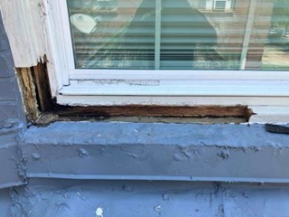 Rotted and water-damaged window trim