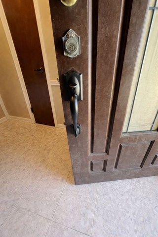 Worn and outdated door hardware in Central Houston